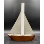 A mid-century chrome and hardwood lamp modelled as a sailing boat 'Plassey', height 36cm to top of
