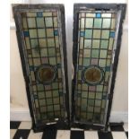 A pair of stained-glass panels depicting a bird to the central pane. Full size 127 x 42cm.