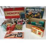 Selection of toys and games to include Monopoly, Stickle Bricks, boxed miniature story book sets; My