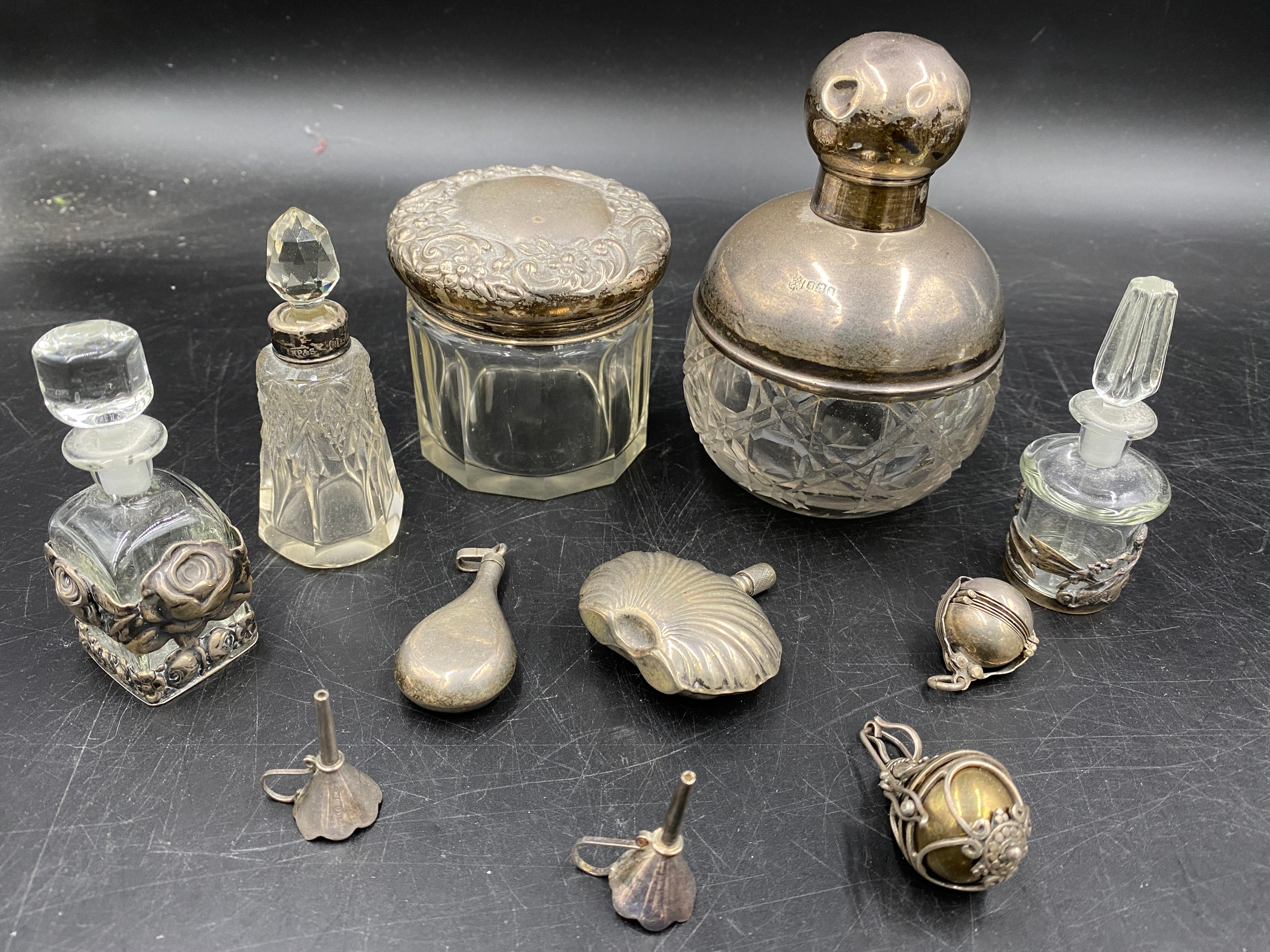 A collection of silver and glass items to include four perfume bottles, perfume pendant, perfume - Image 3 of 4