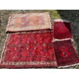 A selection of 4 rugs, largest rug including tassels 145 x 106cm.