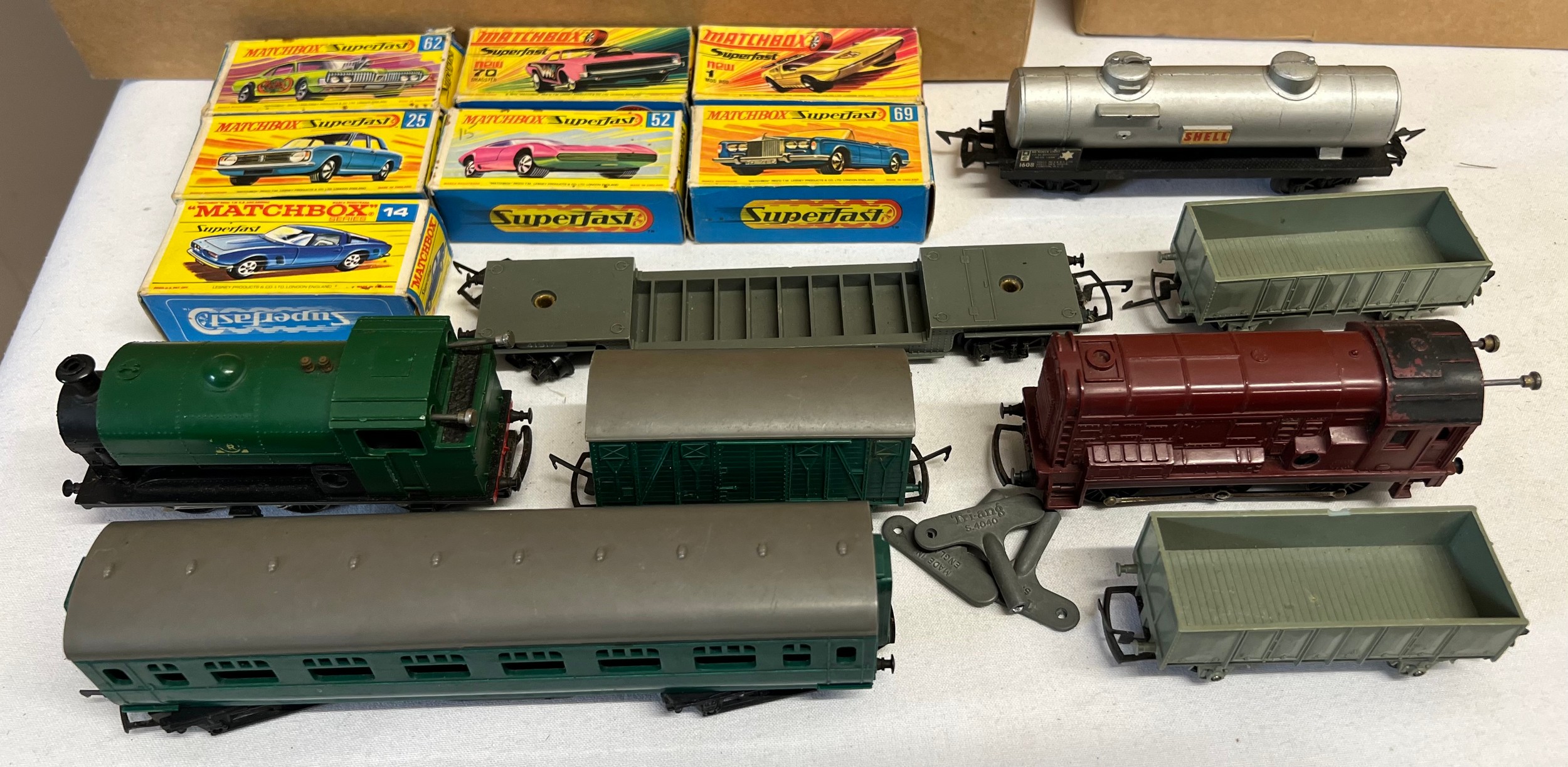 A collection of Matchbox Superfast diecast toys and Triang trains and carriages to include