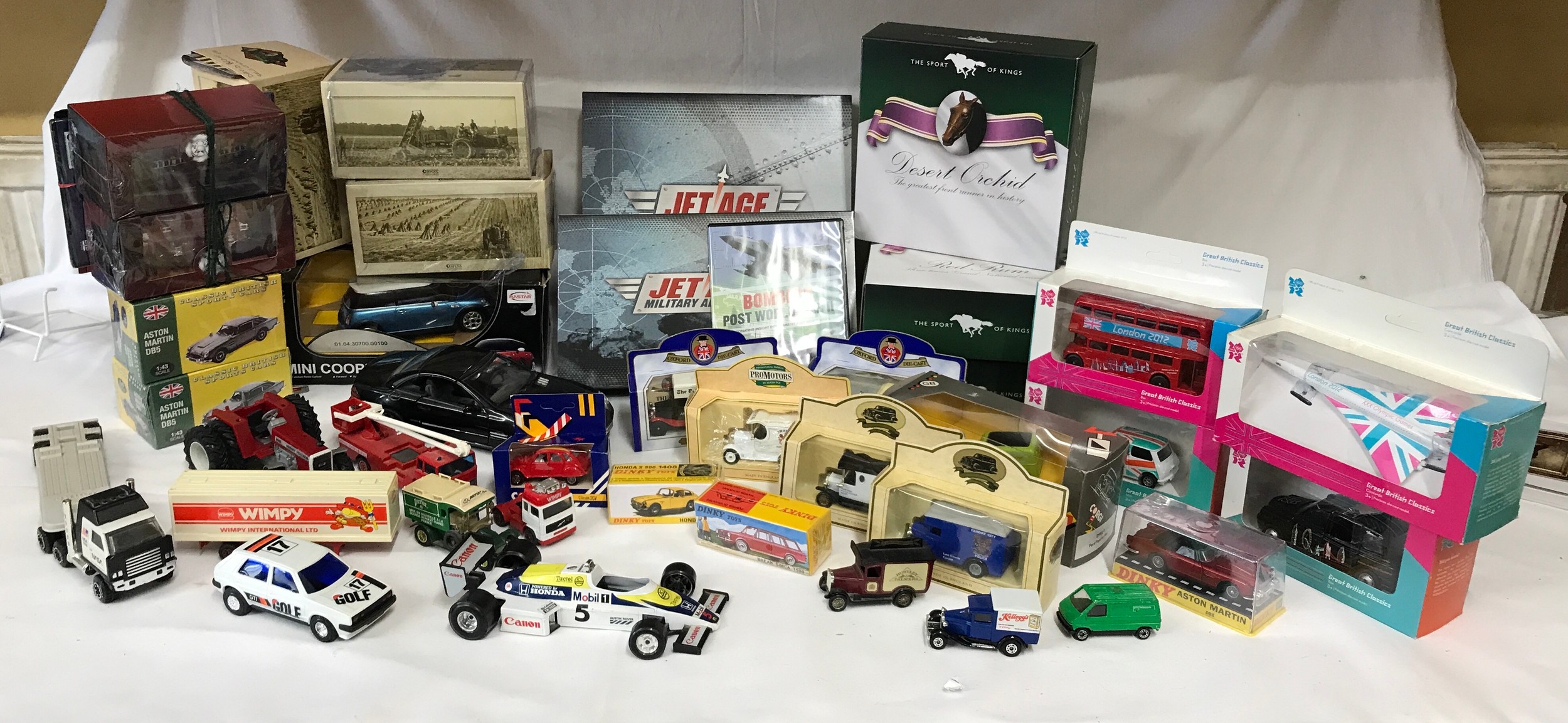 A collection of toys, some boxed, to include Tonka, Matchbox No 38 Armoured Jeep, Dinky, Britains,