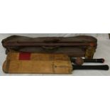 A Vintage leather cricket bag initailled A.C.M. containing 2 x Autograph cricket bats and a ball.