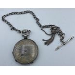 A ladies pocket watch with ornate dial, case marked 'Fine Silver' together with a hallmarked
