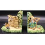 A pair of Beatrix Potter Border Fine Arts Peter Rabbit book ends.