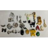 A quantity of vintage brooches and rings to include silver, celluloid etc.