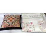 A contemporary part patchwork style quilt with printed patchwork design in pinks and greens approx