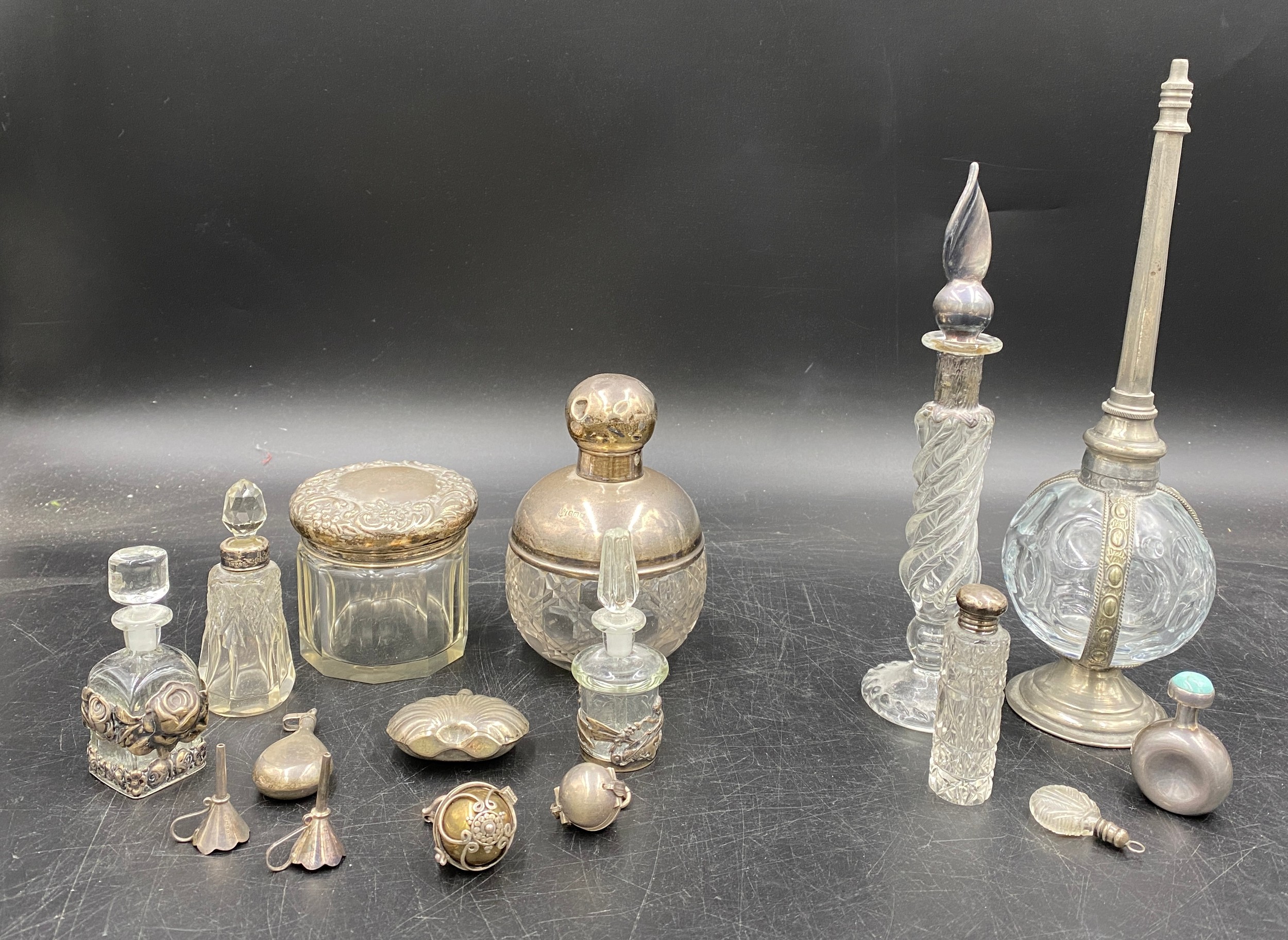 A collection of silver and glass items to include four perfume bottles, perfume pendant, perfume - Image 2 of 4