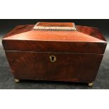 A mahogany sarcophagus caddy with key and two interior lidded compartments on ball feet. 13 d x 22.5