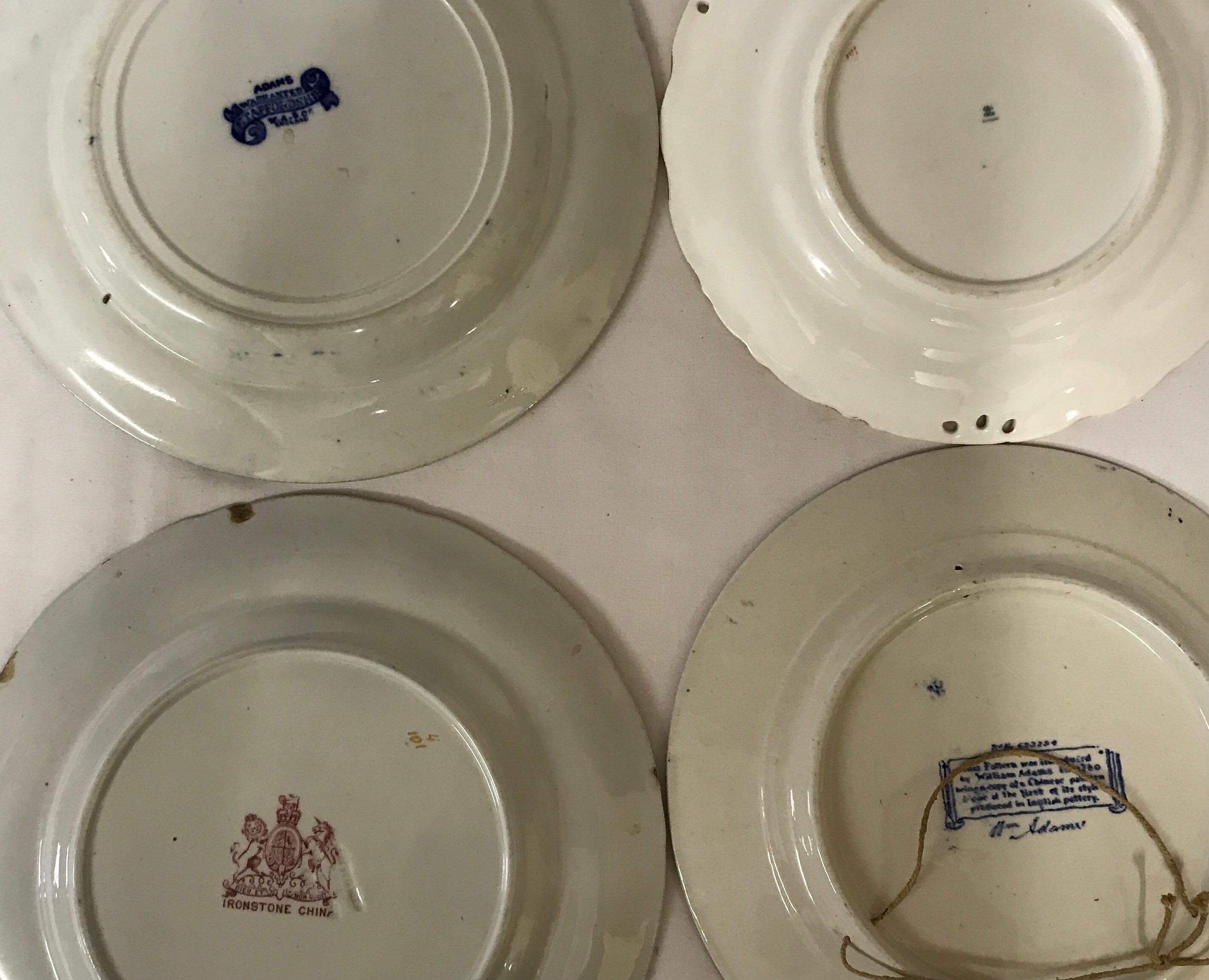 Seven ceramics to include 4 plates and three tazzas. The tazzas are green and white and two have one - Image 5 of 6