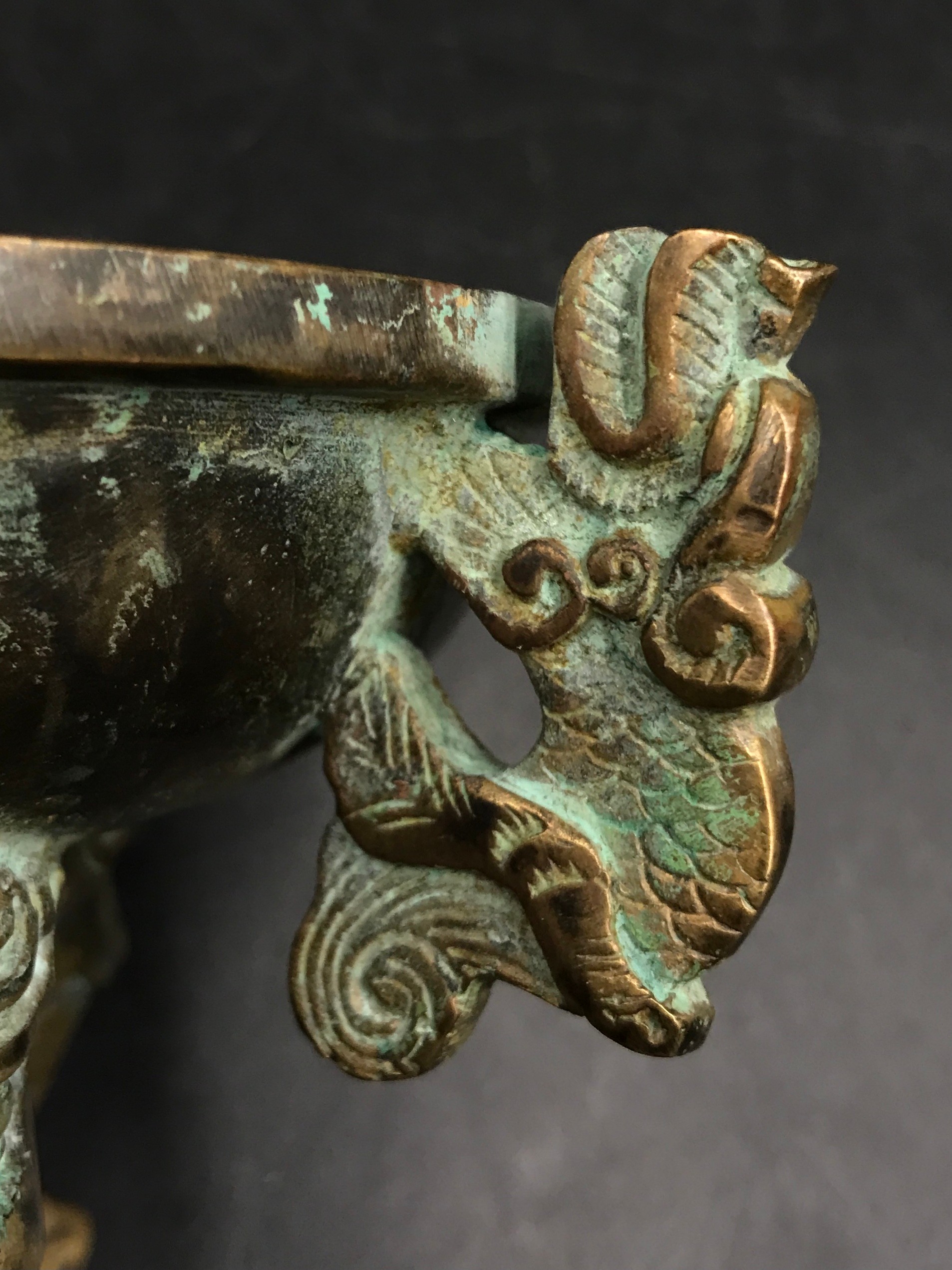 A Chinese bronze incense burner, with lotus finial and dragon handles, raised on three shaped - Image 4 of 6