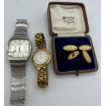 A gentleman’s Rotary wristwatch, a ladies Seiko wristwatch and a pair of cuff links in vintage box.