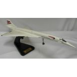 Display model of Concorde by Bravo Delta Models, 60 x 25cm w on stand with the dates 1969-2003.