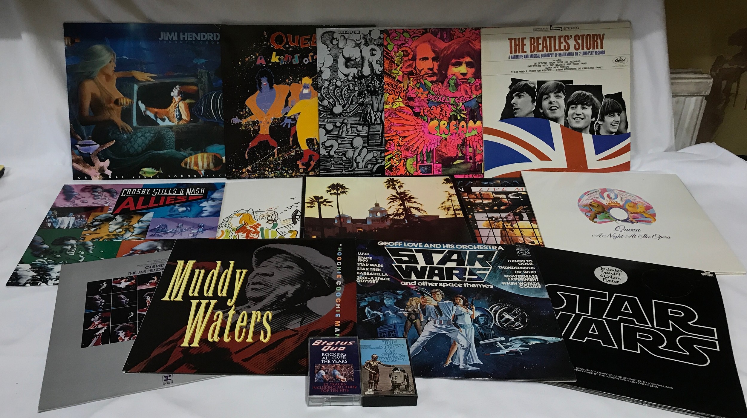 Fourteen LPs and two Cassettes to include The Story of Star Wars, Status Quo Rocking all over the