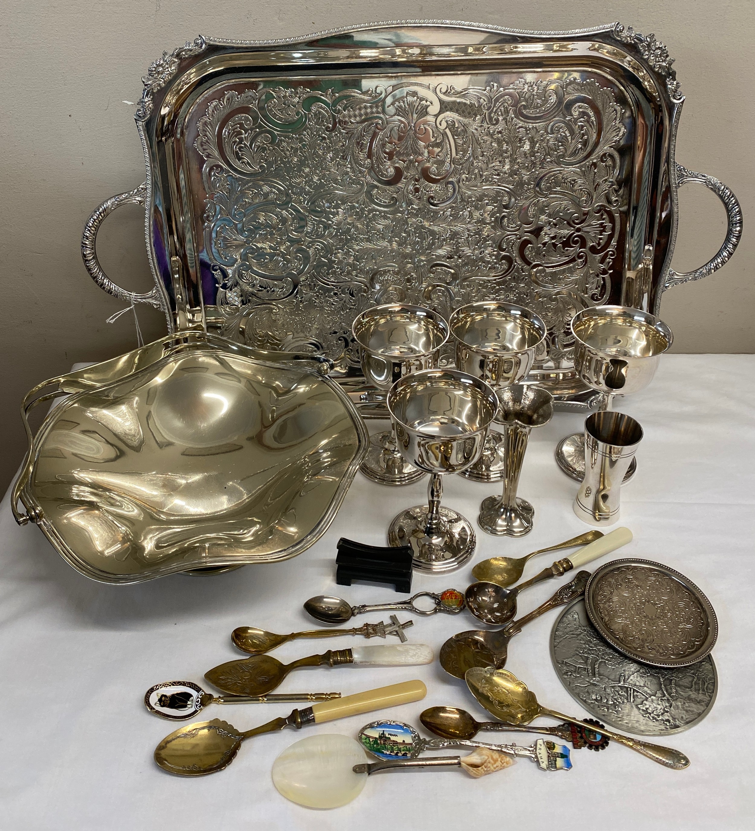 A quantity of silver plate to include two handled tray 56.5cm w, 4 x goblets etc together with a
