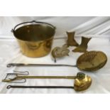 A collection of brassware to include large bucket with swing handle 33cm d, brass utensils and