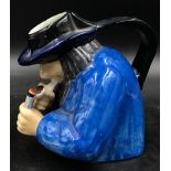 A Henroit Quimper toby smoking pipe jug 15cm h signed a g to underneath.