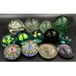 A group of 13 paperweights, various colours and designs to include a Castleford dump and two
