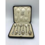 Six silver coffee spoons Sheffield 1924 maker M&W in fitted box with writing to inside lid saying '