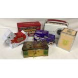 A collection of tins to include a Cadbury's fingers mini van, mini Scottie dog shortbread, M&S party