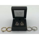A selection of Sheila Fleet jewellery to include two silver coloured rings one with a cubic