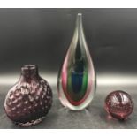 A collection of glass items to include a paper weight, patterned vase and a sommerso standing at 27c
