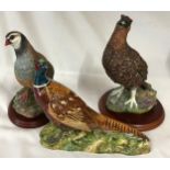 Two Border Fine Arts models Red Grouse A1279, Partridge A0660 along with a Beswick Pheasant 1225.