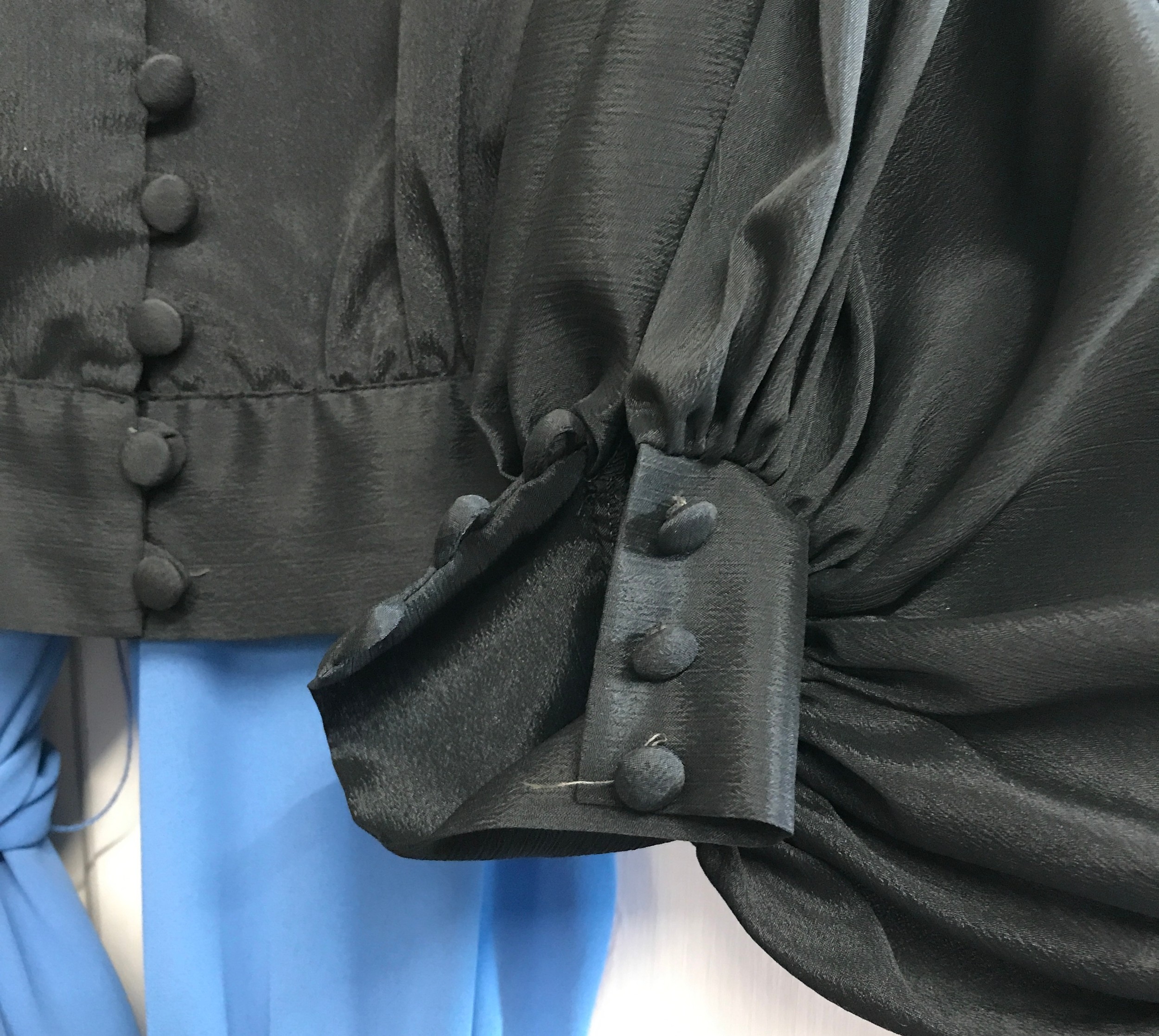 A David Butler 70's Ressler black polyester button box blouse labelled 14 shoulder to hem 44cm - Image 4 of 4
