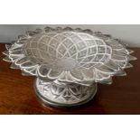 An Indian white metal engraved dish. 99gm.