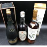 Three bottles of spirits, one a bottle of Remy Martin Cognac, 2 x bottles of Highland Malt Scotch