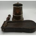 A vintage wooden football clacker together with a 19thC copper plated tankard 15cm h.