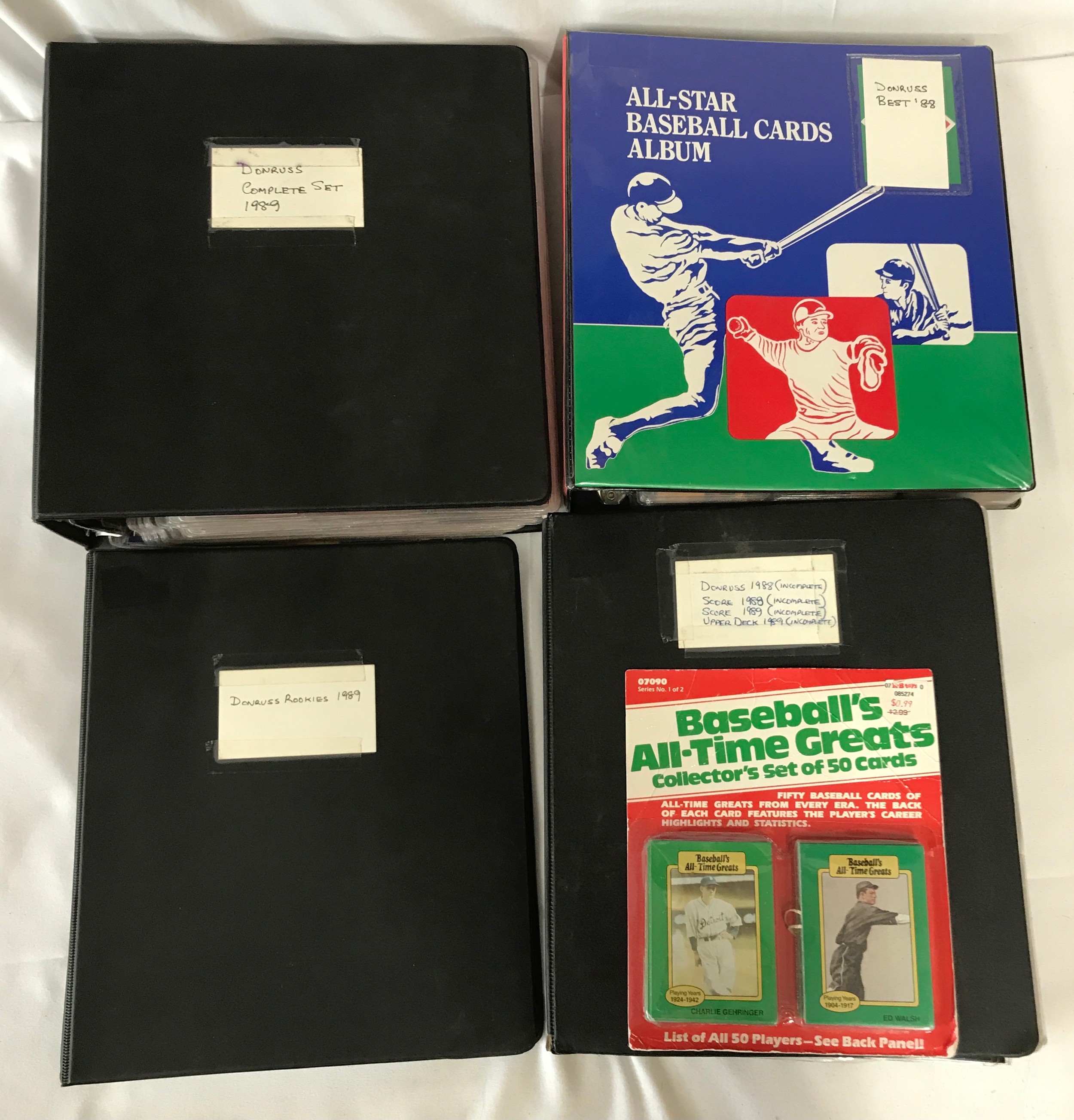 A collection of folders containing a complete set dated 1989 of Donruss baseball cards, a mix of