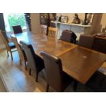 A good quality continental oak large extending dining table. 180 w x 115 d x 74cm h (closed) 148cm w