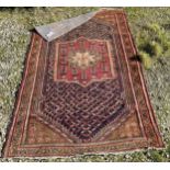 A good quality Iranian rug. 210 x 130cm.