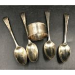 Four silver teaspoons London 1806 maker SA and the initial C at the end, and a napkin ring