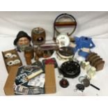 A miscellany of items to include a fishing reel, fisherman's head pot, oak games barrel, porcelain