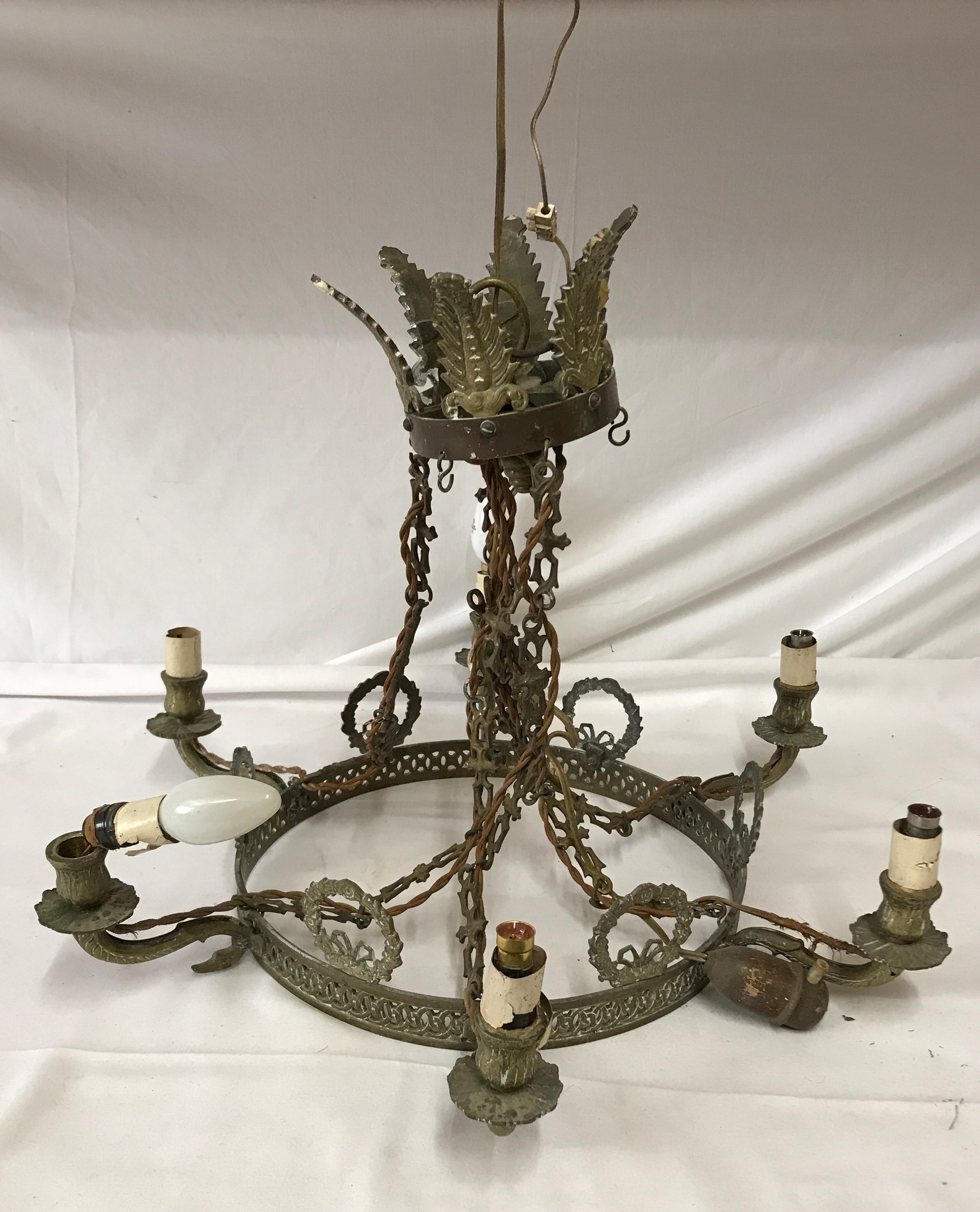 A decorative vintage six branch ceiling light fitting.