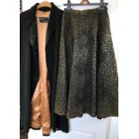 Black silk evening coat, medium, with tan lining and one button to waist along with a dark green