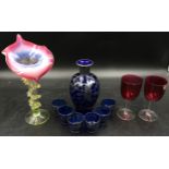 Ten pieces of various glass comprising a pair of cranberry wine glasses, a coloured glass trumpet