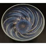 A Lalique 'Poissons' opalescent glass dish, moulded with fish, etched mark 'R. Lalique France'. No