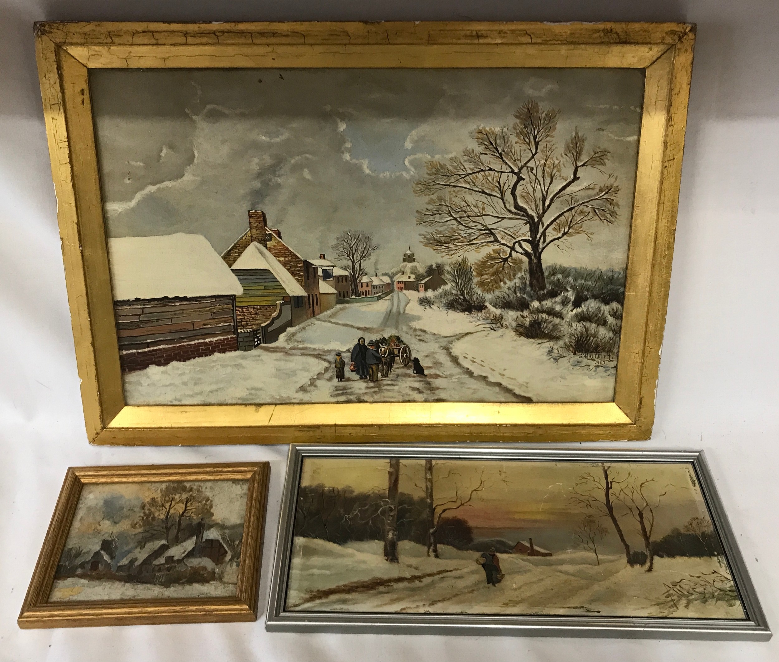 Three paintings depicting outdoor snowy winter scenes largest image on canvas and signed S. Whiteley