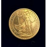 British 1/4 oz fine gold 25 pounds coin dated 1987.