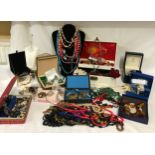 Large collection of costume jewellery to include necklaces, earrings, brooches, beads etc