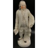 A Staffordshire figure of Benjamin Franklin on circular base 38cm h.