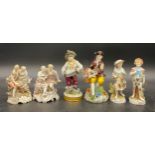 Six 19thC Continental porcelain figurines to include two pairs of figurines and two others.