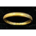 A 22 carat gold wedding band. Weight 3g. Size O.