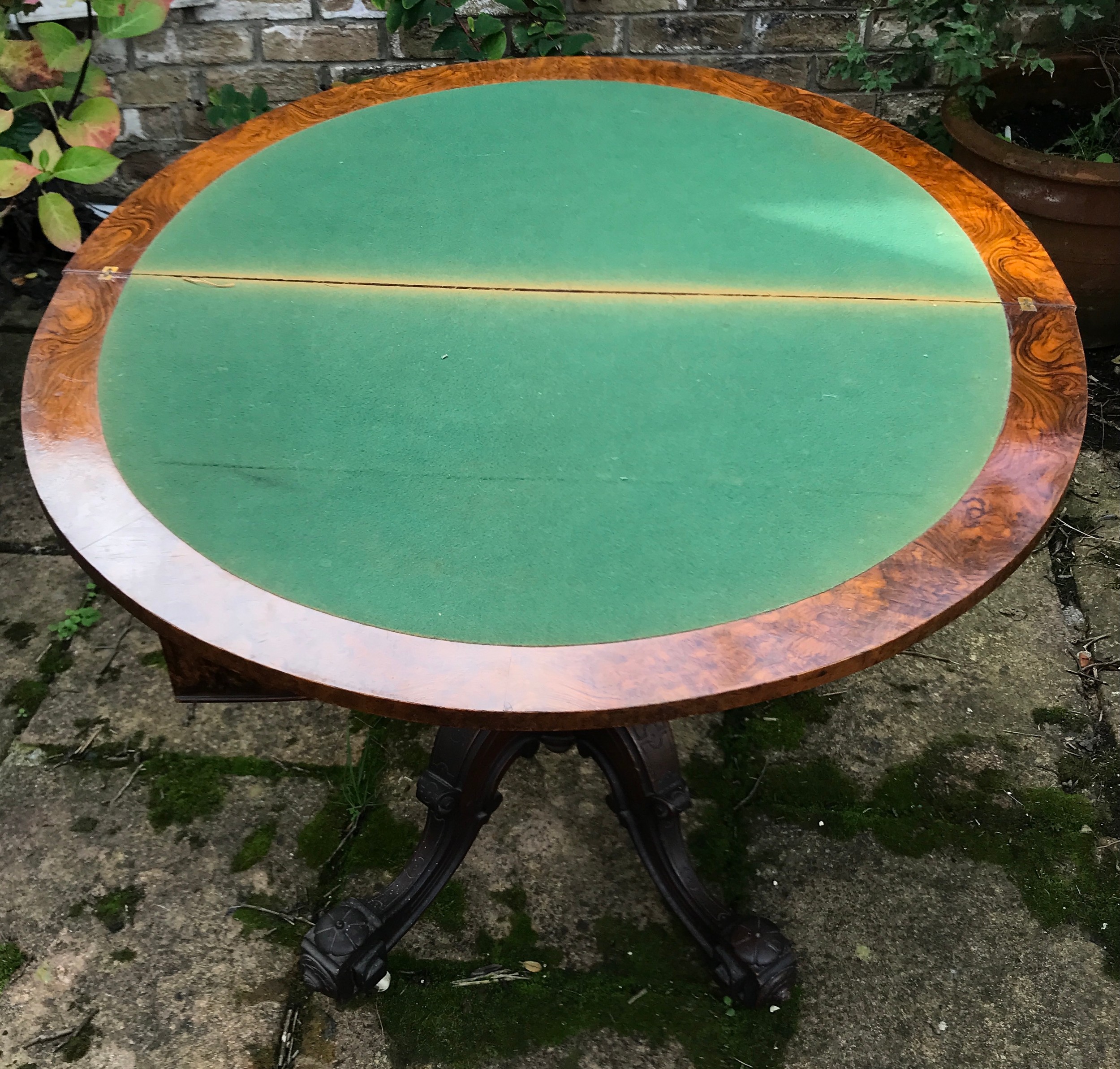 A Victorian walnut demilune card table, hinged top enclosing a baize lined playing surface, turned - Image 2 of 7