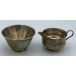 A silver jug Sheffield 1936 maker Lee & Wigfull (Henry Wigfull) 6cm h and a silver sugar bowl London