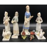 A collection of six ceramic models to include four large marked models and two Beswick birds